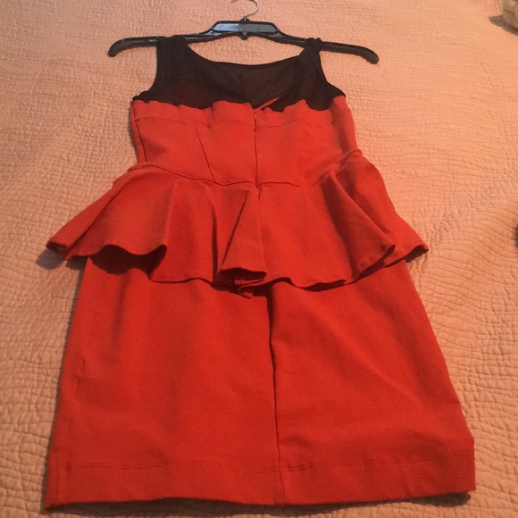 A orange dress fitting dress too and clear top . - Picture 2 of 2